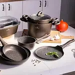 Nowoczesny zestaw garnków i patelni Domowy Zakątek, idealny do kuchni, odporne na wysokie temperatury, z powłoką antiadhezyjną, stylowe i funkcjonalne.